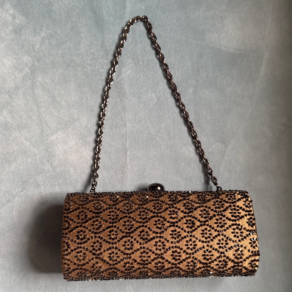Elegant Black And Gold Clutch Bag